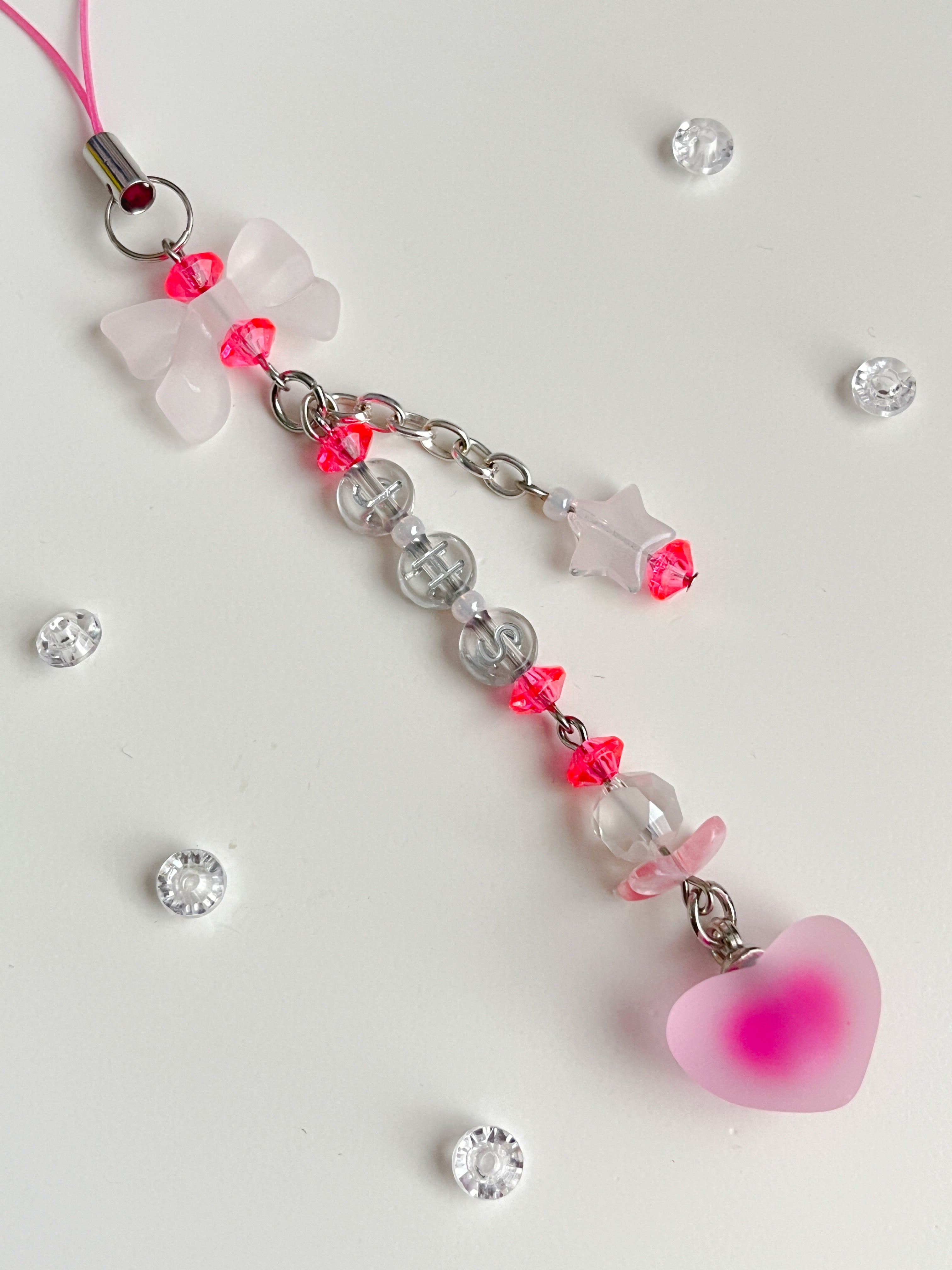 Bow and heart phone charm